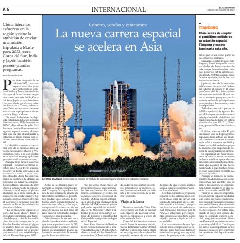 Image of Spanish language newspaper article with a picture of a rocket launching